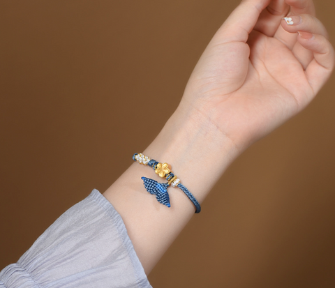 Gold Flower Blue Braided Bracelet