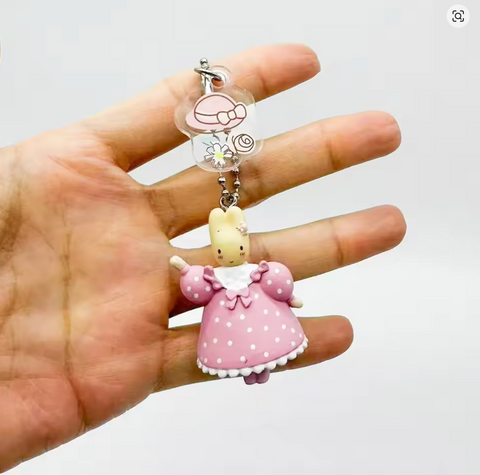 Maroon Cream Keychain Statues