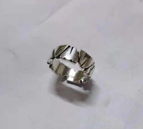 Carved Triangles Ring