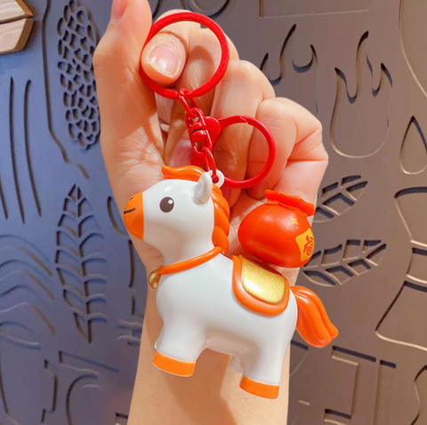 Carrying Gold Horse Keychain