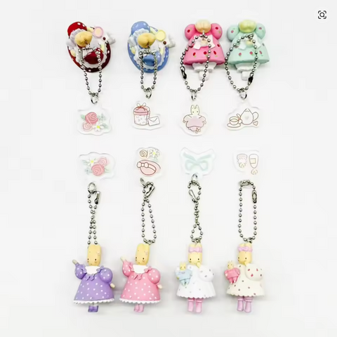 Maroon Cream Keychain Statues